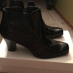 Never worn black Franco Sarto black heel boots.